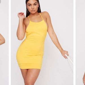 Yellow open back mini dress